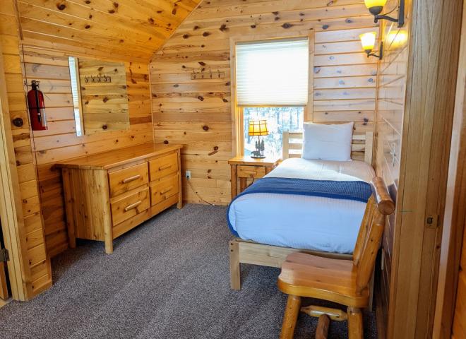 Loft area with a twin bed.