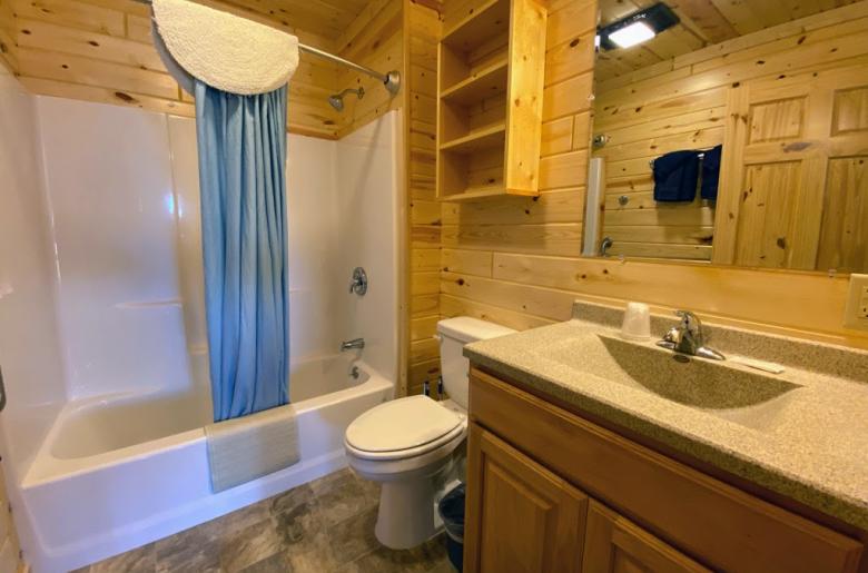 Loft bathroom with a standard tub/shower.