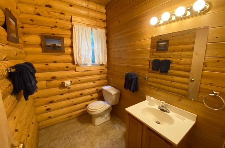 Main level half bathroom located near the entrance.