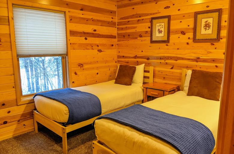 Main floor bedroom with two XL twins.