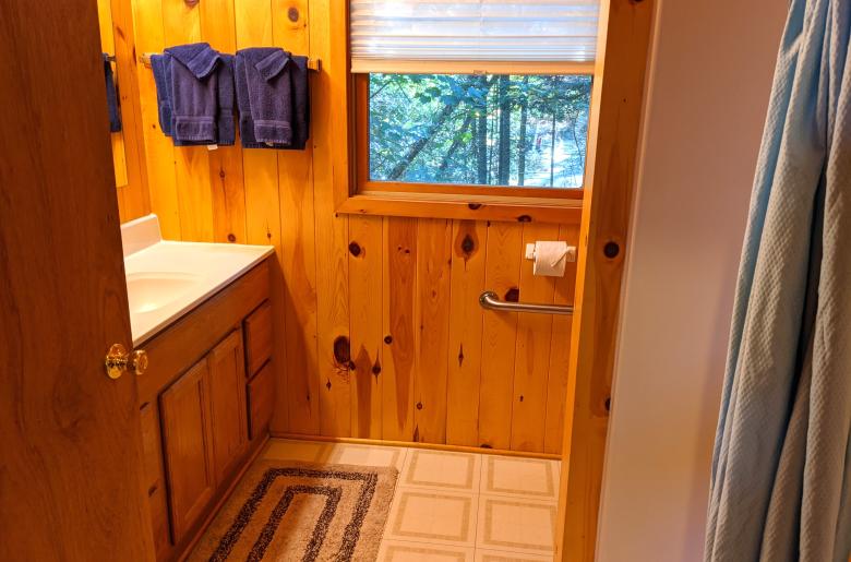 Main floor bathroom with an oversized shower stall.