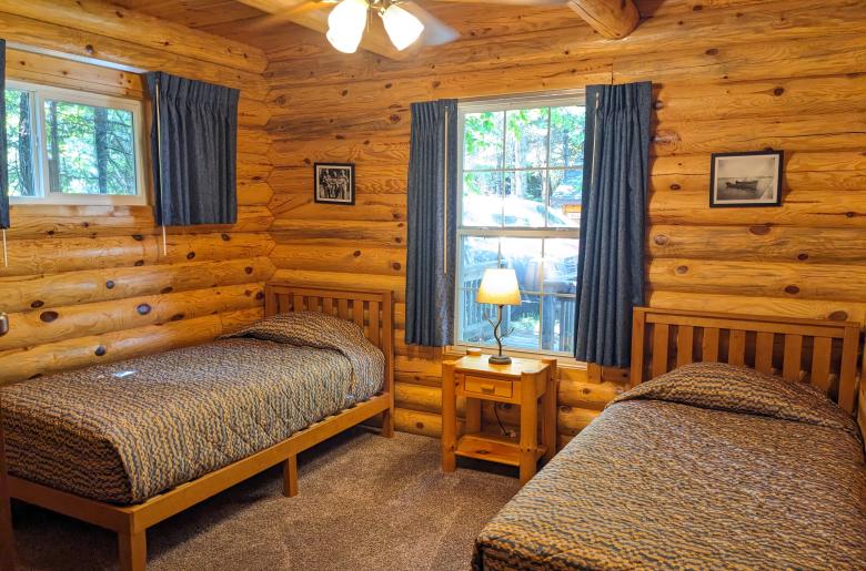 Main floor bedroom with two twin beds.