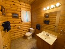 Main level half bathroom located near the entrance.